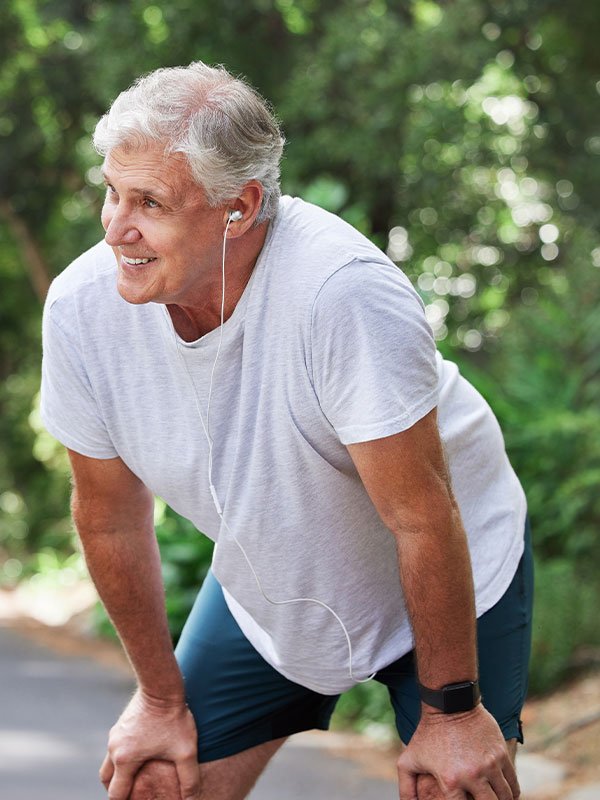 man-after-being-treated-for-joint-pain man smiling after receiving treatment for knee pain at Balfour Health Center